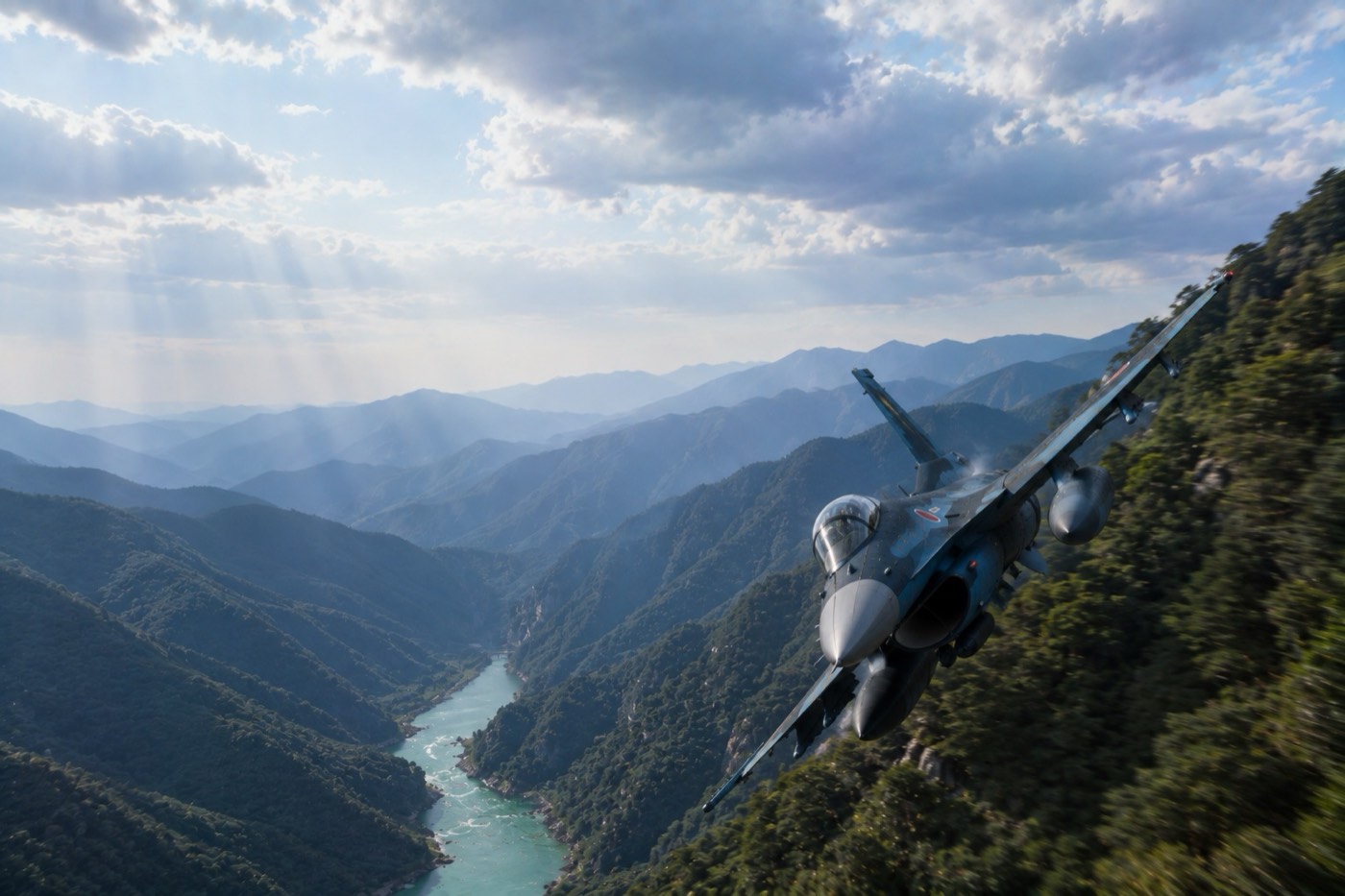 An F-2 banking low through a green river gorge